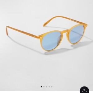 Oliver Peoples sunglasses.